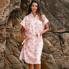 The Palm Surf Poncho is a sand-free, super-absorbent, quick-drying hooded towel. Lightweight, antibacterial, and soft, with a pocket and optional waist tie.