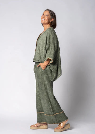 Khaki full-length linen pants made from 100% lightweight, breathable linen. Designed with an airy, relaxed cut for unrestricted movement and all-day comfort, offering a clean, timeless look suitable for warm-weather wear