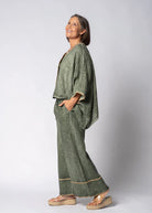 Khaki full-length linen pants made from 100% lightweight, breathable linen. Designed with an airy, relaxed cut for unrestricted movement and all-day comfort, offering a clean, timeless look suitable for warm-weather wear