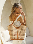 Paris Tote in tan featuring a hand-woven design with a spacious interior and elegant, versatile silhouette.
