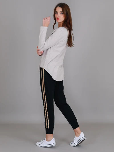 Angora Penola Long Sleeve T-Shirt featuring a crew neckline, relaxed full-length sleeves, straight silhouette and curved raw-edge hi-lo hem.