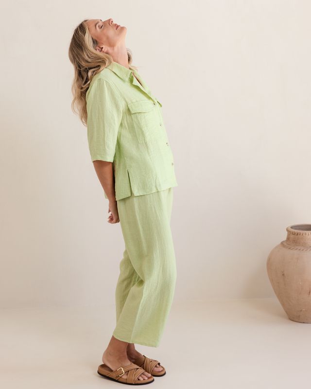 Pistachio linen-rayon drawstring pants with relaxed straight-leg fit and adjustable waist for comfortable everyday wear.