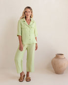 Pistachio linen-rayon drawstring pants with relaxed straight-leg fit and adjustable waist for comfortable everyday wear.