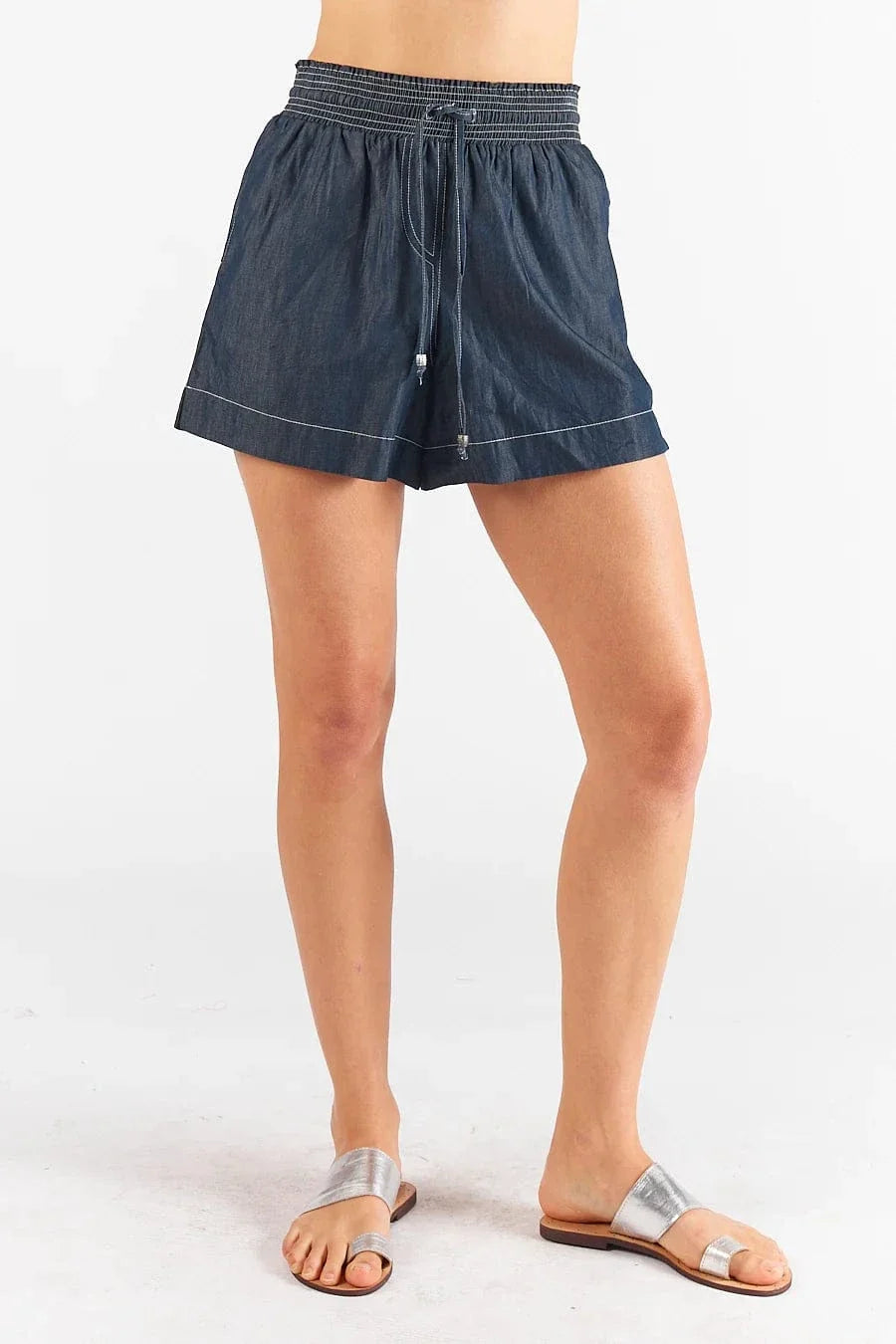 Pula Shorts in white and denim, featuring an elasticated waistband and side pockets.