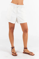 Pula Shorts in white and denim, featuring an elasticated waistband and side pockets.