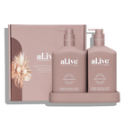 Alive Raspberry Blossom & Juniper Hand & Body Duo in Illuminated White featuring a 500ml hand and body wash and 500ml hand and body lotion in interlocking bottles with a matching tray.
