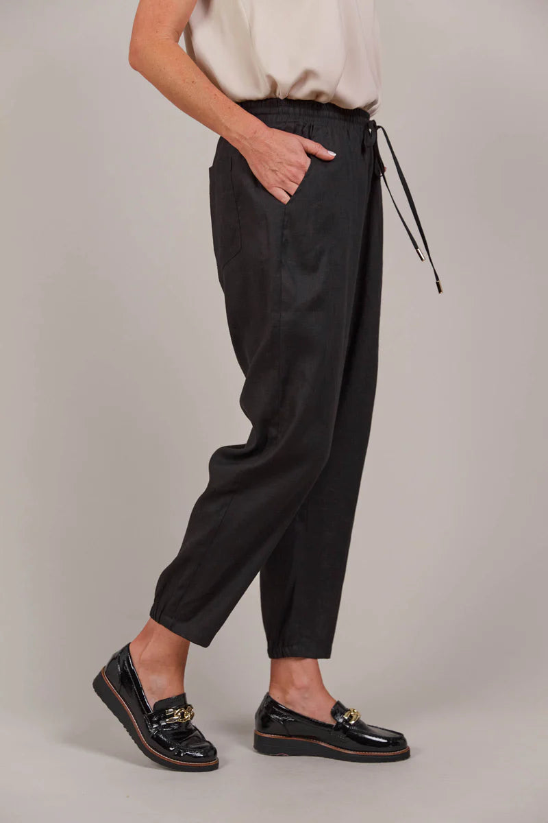 Relaxed-fit pant with an elastic waist, adjustable drawstring, and tapered ankle-length cut, made from a breathable linen-cotton blend for effortless style.