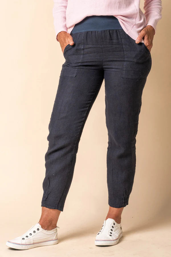 The Navy Rianne Linen Pants by Imagine Fashion are currently available at Rawspice Boutique.