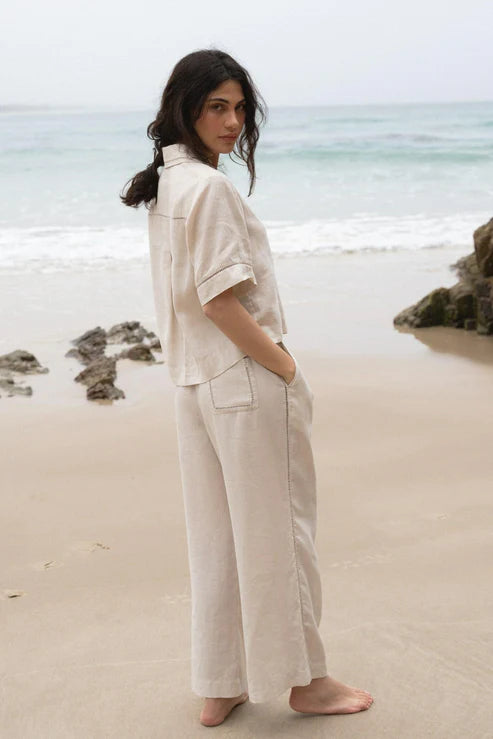 Rika Linen Pants in Chalk: Light, breathable linen fabric with a relaxed fit, perfect for warm weather styling.