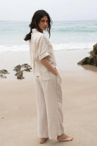 Rika Linen Pants in Chalk: Light, breathable linen fabric with a relaxed fit, perfect for warm weather styling.