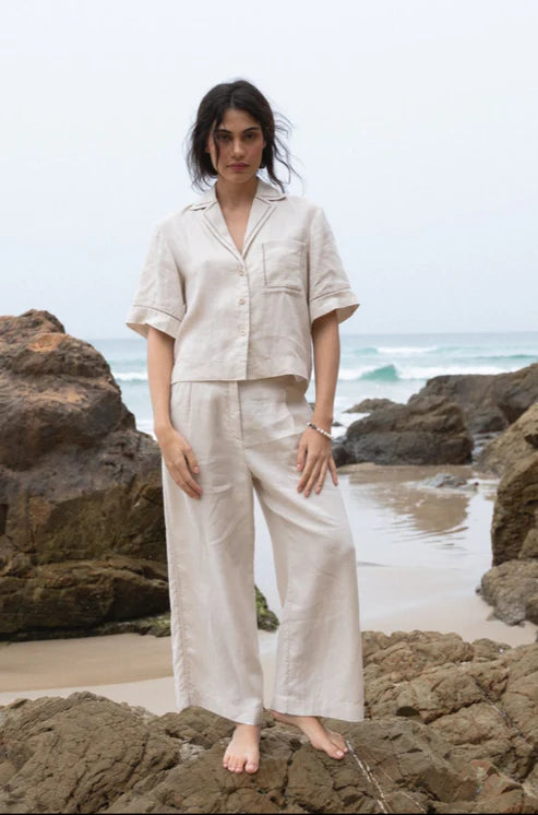 Rika Linen Pants in Chalk: Light, breathable linen fabric with a relaxed fit, perfect for warm weather styling.