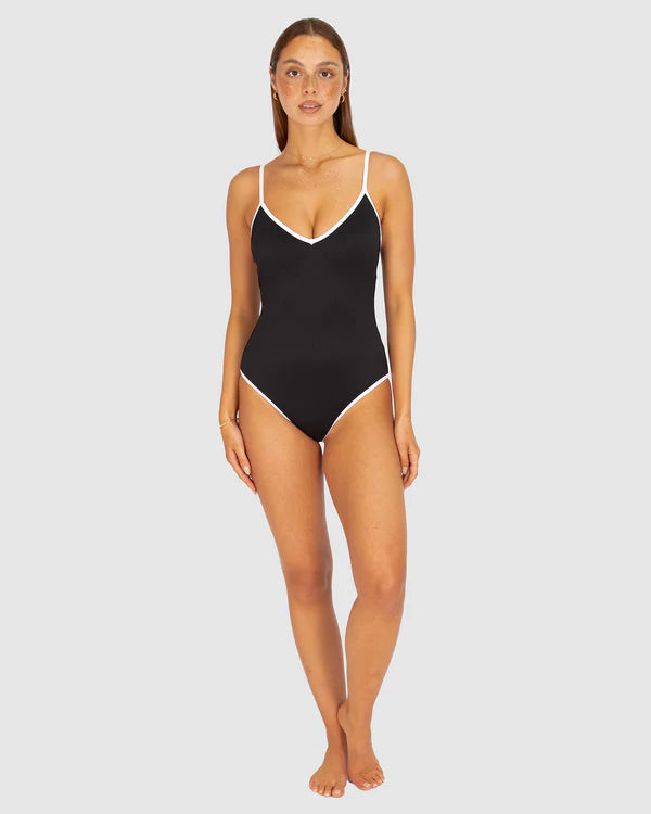 A sleek and sophisticated one-piece swimsuit in buttery-soft Rococco fabric, featuring a flattering V-neckline and structured shaping for a confident, elegant fit.
