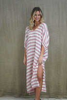 Rosa Elasticated Sleeves Kaftan in rose pink with white stripes, made from 100% plain and mesh linen. Features a relaxed silhouette, breathable fabric, and elasticated sleeves, evoking a sophisticated coastal vibe.