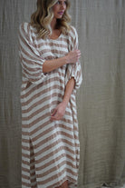 Rosa Elasticated Sleeves Kaftan in antique rust with white stripes, made from 100% plain and mesh linen. Features a relaxed silhouette, breathable fabric, and elasticated sleeves, evoking a sophisticated coastal vibe.