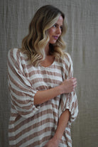 Rosa Elasticated Sleeves Kaftan in antique rust with white stripes, made from 100% plain and mesh linen. Features a relaxed silhouette, breathable fabric, and elasticated sleeves, evoking a sophisticated coastal vibe.