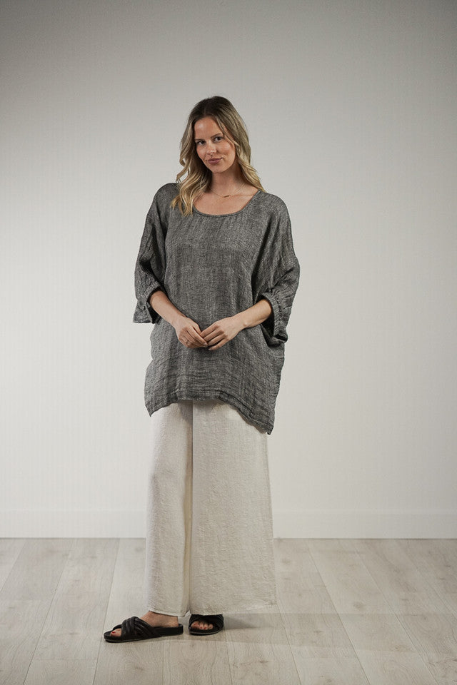 Black and white woven Rosetta linen top with a relaxed fit, breathable mesh texture and soft stonewashed finish.