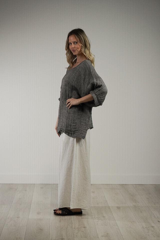 Black and white woven Rosetta linen top with a relaxed fit, breathable mesh texture and soft stonewashed finish.