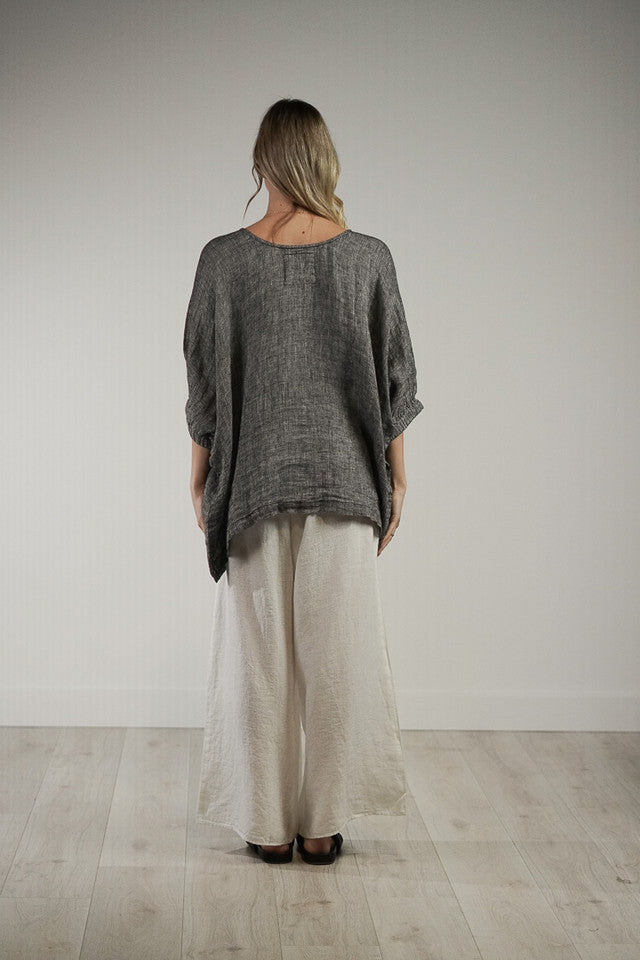 Black and white woven Rosetta linen top with a relaxed fit, breathable mesh texture and soft stonewashed finish.
