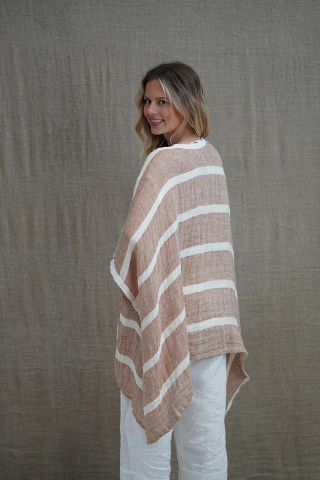 The Rust & White Stripes Carmen Cardigan by Rustic Linen is currently available at Rawspice Boutique.