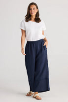 A woman modelling Sailor Pants Wide Leg in Navy by Holiday