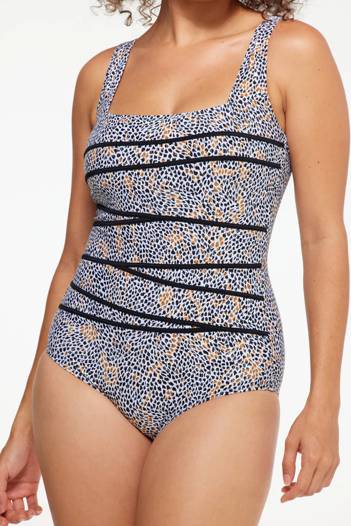 A woman close up modelling The Savanna Square Binding One Piece Swimwear with Tummy Control by TOGS