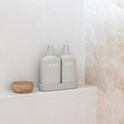 Alive Sea Cotton & Coconut Hand & Body Duo in Illuminated White featuring a 500ml hand and body wash and 500ml hand and body lotion in interlocking bottles with a matching tray.
