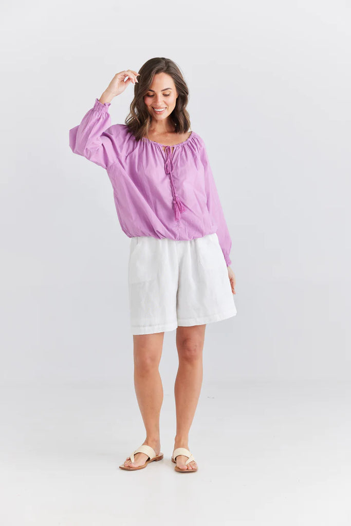 The Lilac Seaside Top by Holiday is currently available at Rawspice Boutique.