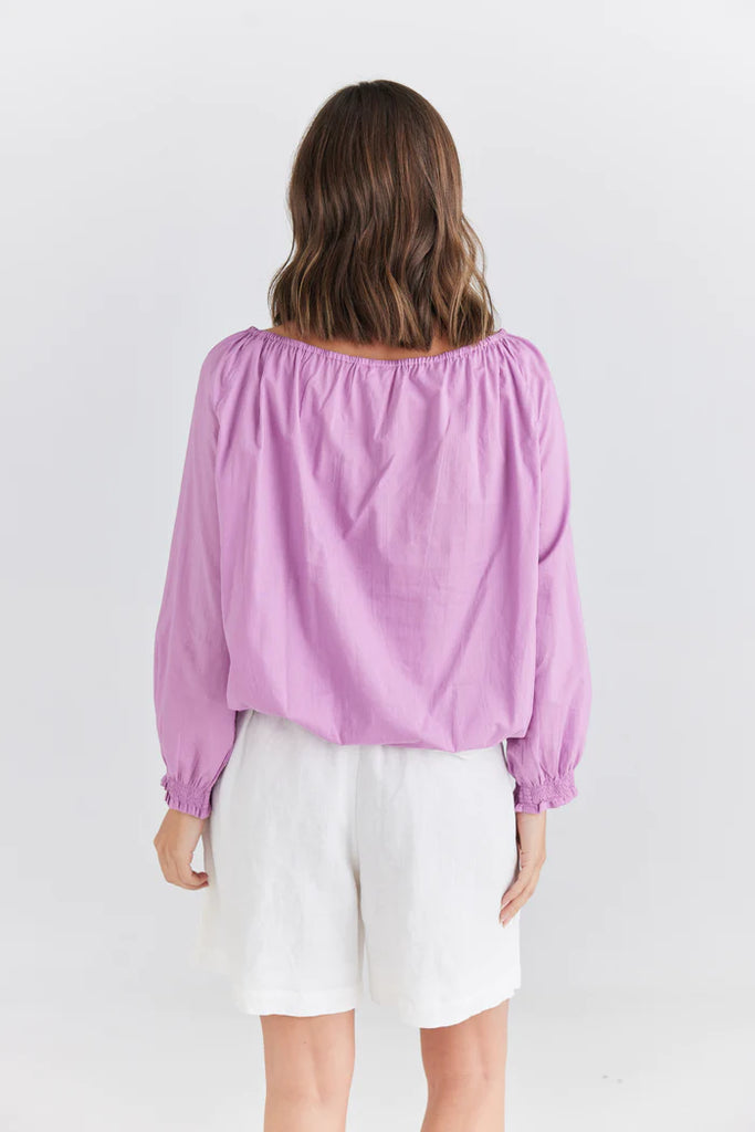 The Lilac Seaside Top by Holiday is currently available at Rawspice Boutique.