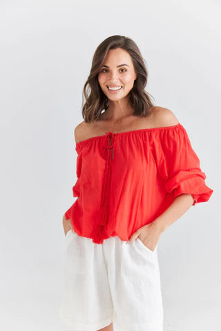 The  Scarlet Seaside Top by Holiday is currently available at Rawspice Boutique.