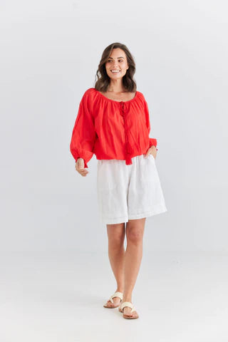 The  Scarlet Seaside Top by Holiday is currently available at Rawspice Boutique.