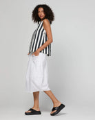 Shiro Top in Mono Stripe featuring a sleeveless design, relaxed A-line fit, round neckline and back keyhole detail.