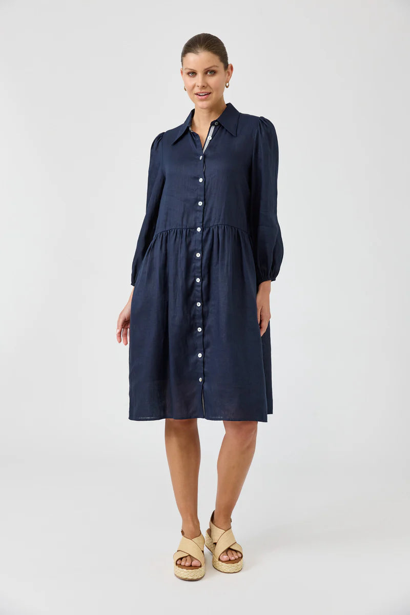 Navy midi shirt dress with a button-down front, long balloon sleeves, and a contrast ribbon detail, crafted from luxurious linen for a relaxed yet chic look.