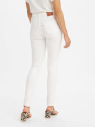 The Soft Clean White  Women's 311 Shaping Skinny Jeans by Levi's® are currently available at Rawspice Boutique.