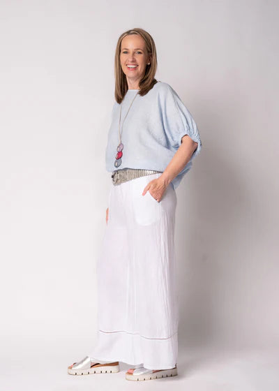 Solene Linen Top in baby blue with a relaxed fit, round neckline, elasticated mid-length sleeves and a lightweight linen finish.