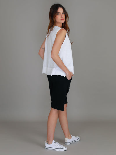 White Sonya Tank featuring a crew neckline, wide shoulder straps, relaxed cropped fit and raw-edge rib hem.