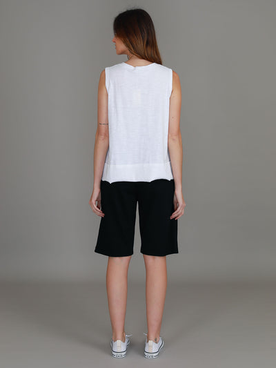 White Sonya Tank featuring a crew neckline, wide shoulder straps, relaxed cropped fit and raw-edge rib hem.