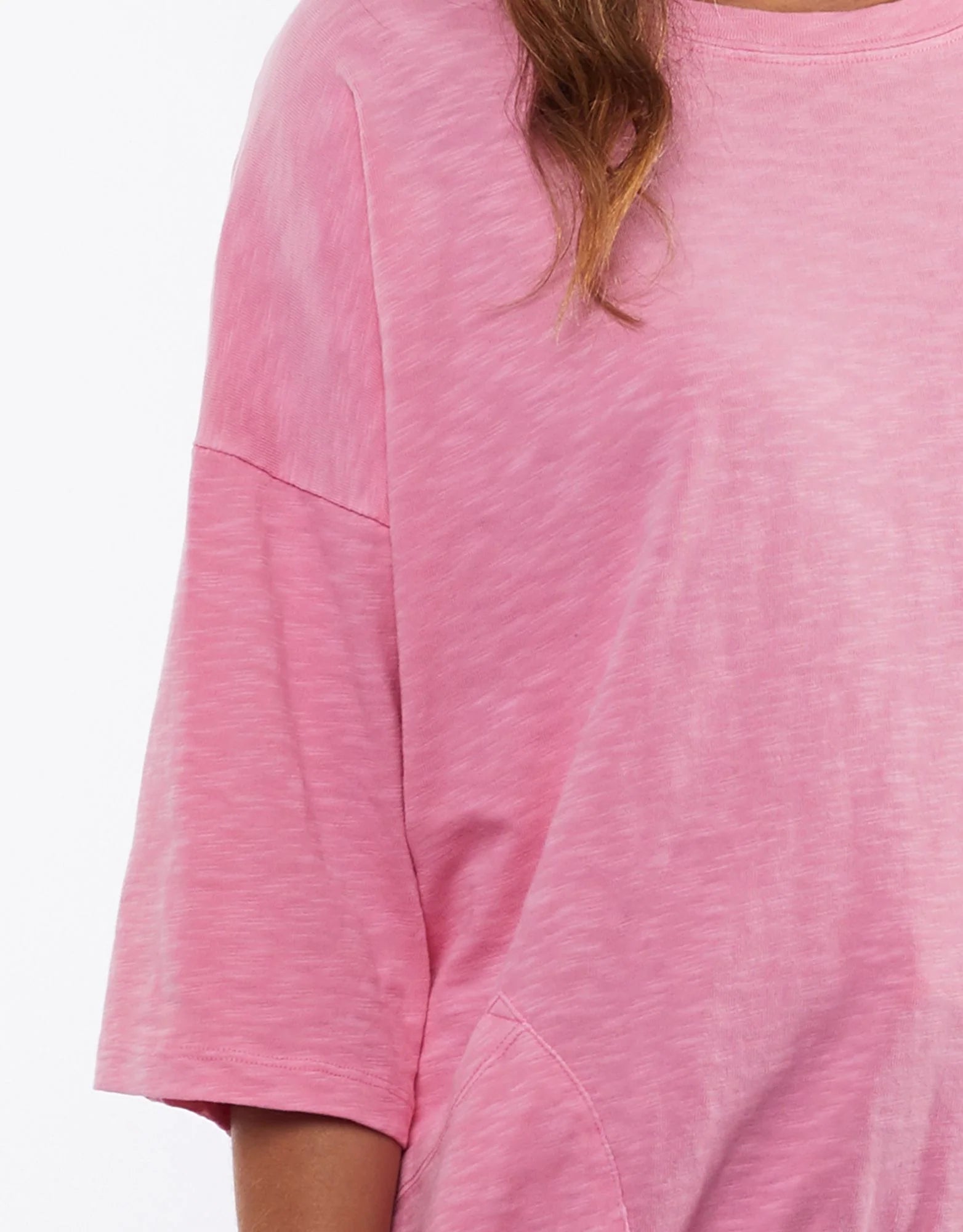 The Super Pink Fundamental Mazie Sweat by Elm is available at Rawspice Boutique.