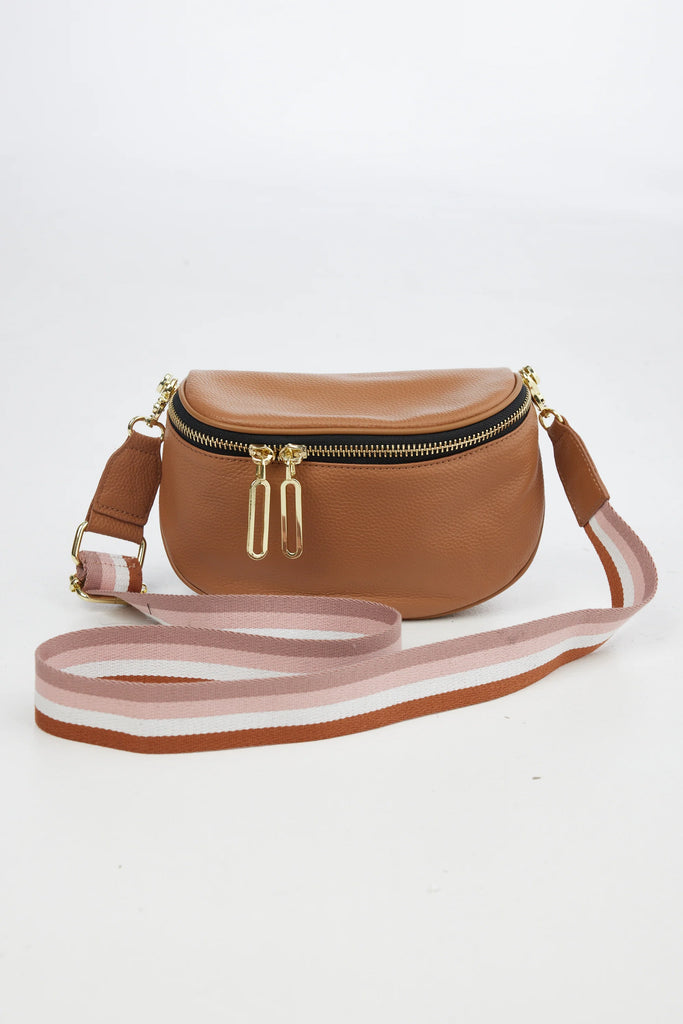 The Kensington Cross Body Bag - Tan + Stripe by Holiday is currently available from Rawspice Boutique.