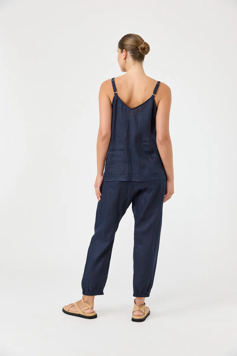 Studio Tank in navy with square V-neck, adjustable straps, relaxed fit, and soft hem in a lightweight fabric.