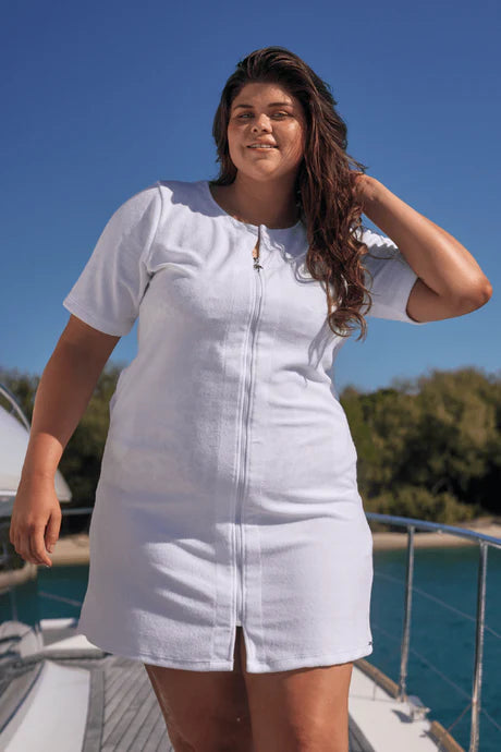 White Terry Towelling Zip-Through Dress with short sleeves, a full-length zip, and side pockets, designed for comfort and practicality.