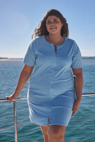 Light Blue Terry Towelling Zip-Through Dress with short sleeves, a full-length zip, and side pockets, designed for comfort and practicality.