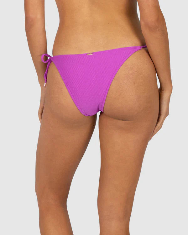 The Hibiscus Rococco Rio Tieside Bikini Bottom by Baku is available at Rawspice Boutique.
