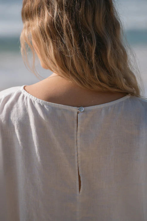 The Ivory Tina Linen Top by Lilly Pilly is available at Rawspice Boutique. 