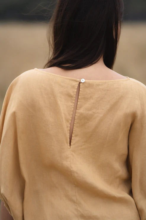 The Sand Tina Linen Top by Lilly Pilly is available at Rawspice Boutique.