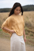 The Sand Tina Linen Top by Lilly Pilly is available at Rawspice Boutique.