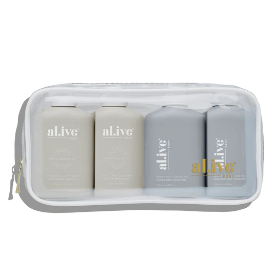 al.ive body Travel Essentials Set featuring White Tea & Argan Shampoo and Conditioner and Sea Cotton & Coconut Hand & Body Wash and Lotion in a sleek travel case.
