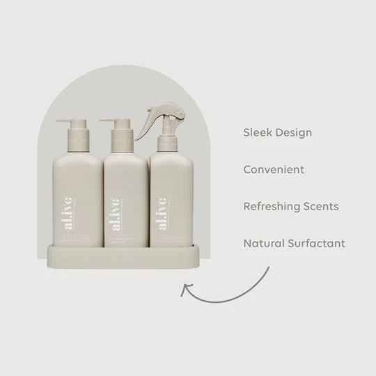 The Alive Kitchen Trio Set, featuring Dishwashing Liquid and Bench Spray in Lemon & Pomegranate scent, and Hand Wash in Watermelon & Lime scent, all neatly arranged in a sleek, custom tray. The white bottles with vibrant, fresh-colored labels are displayed on a clean countertop, exuding a refreshing and vibrant aesthetic with fruity, citrus-inspired fragrances.