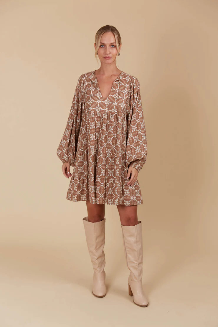 Mini linen-blend dress with a graceful V-neckline, voluminous sleeves, and a full hem, ideal for both warm-weather outings and layered cool-season looks.