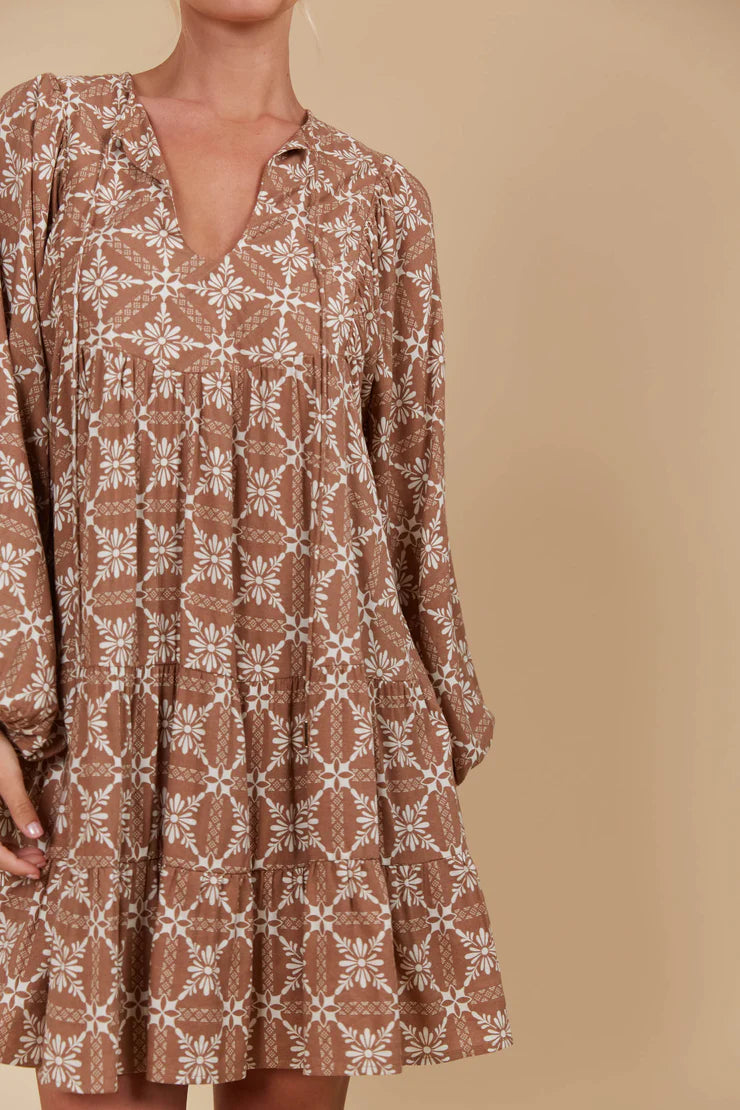 Mini linen-blend dress with a graceful V-neckline, voluminous sleeves, and a full hem, ideal for both warm-weather outings and layered cool-season looks.