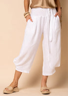 The White Addison Linen Pants by MIRRA MIRRA by IMAGINE FASHION are available at Rawspice Boutique.